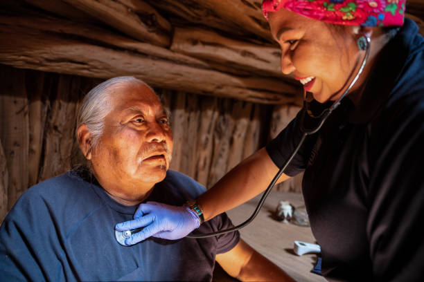 Healthcare provider caring for Indigenous elder
